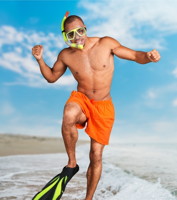 man with a snorkel in a studio with a chosen aesthetic background image